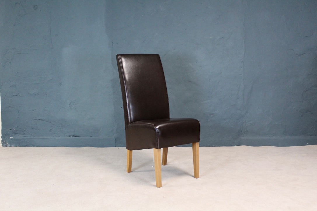 Roll Back Faux Leather Dining Chair sters Distinctive Furniture